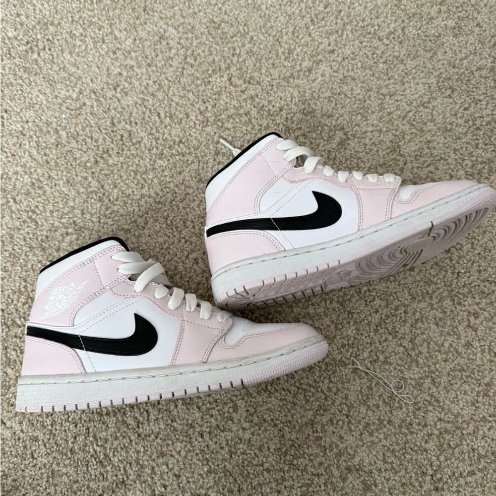 Nike Jordan 1 Pink and White Sneakers with Black Swoosh